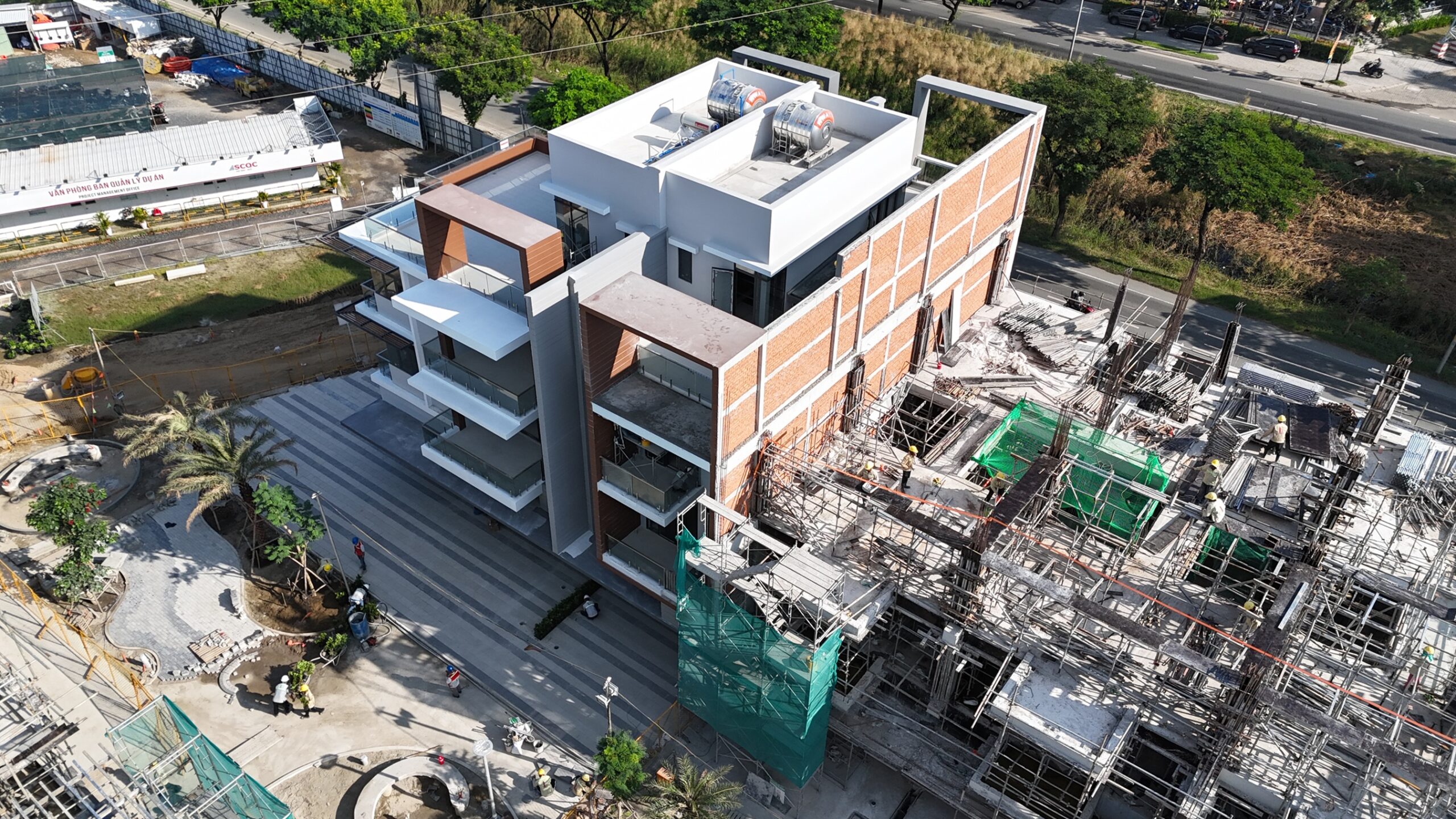 Slider Zone 1: Units C.01 and C.02 are under tiling works for yards and balcony railing installation.